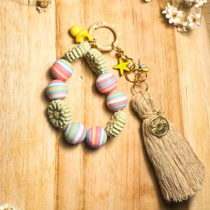 Porte clés "grigri" sable